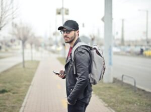 A man wearing a black leather jacket & grey backpack walking down the sidewalk. Did you know PTSD counseling in Portland, OR can help you heal from traumatic memories? Break the avoidant cycle today.