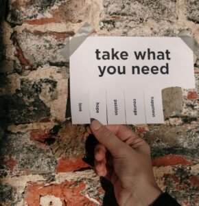 A piece of paper that says "take what you need". Anxiety counseling in Portland, OR can help you discover positive affirmations to quiet your anxiety. Get started with our therapists today.