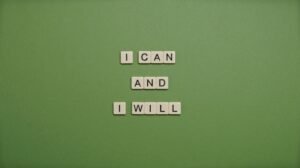 Scrabble letters that read "I CAN AND I WILL" on a green background. Representing how positive affirmations can help you tackle your anxious thoughts. Discover how anxiety counseling in Portland, OR can help your healing journey.