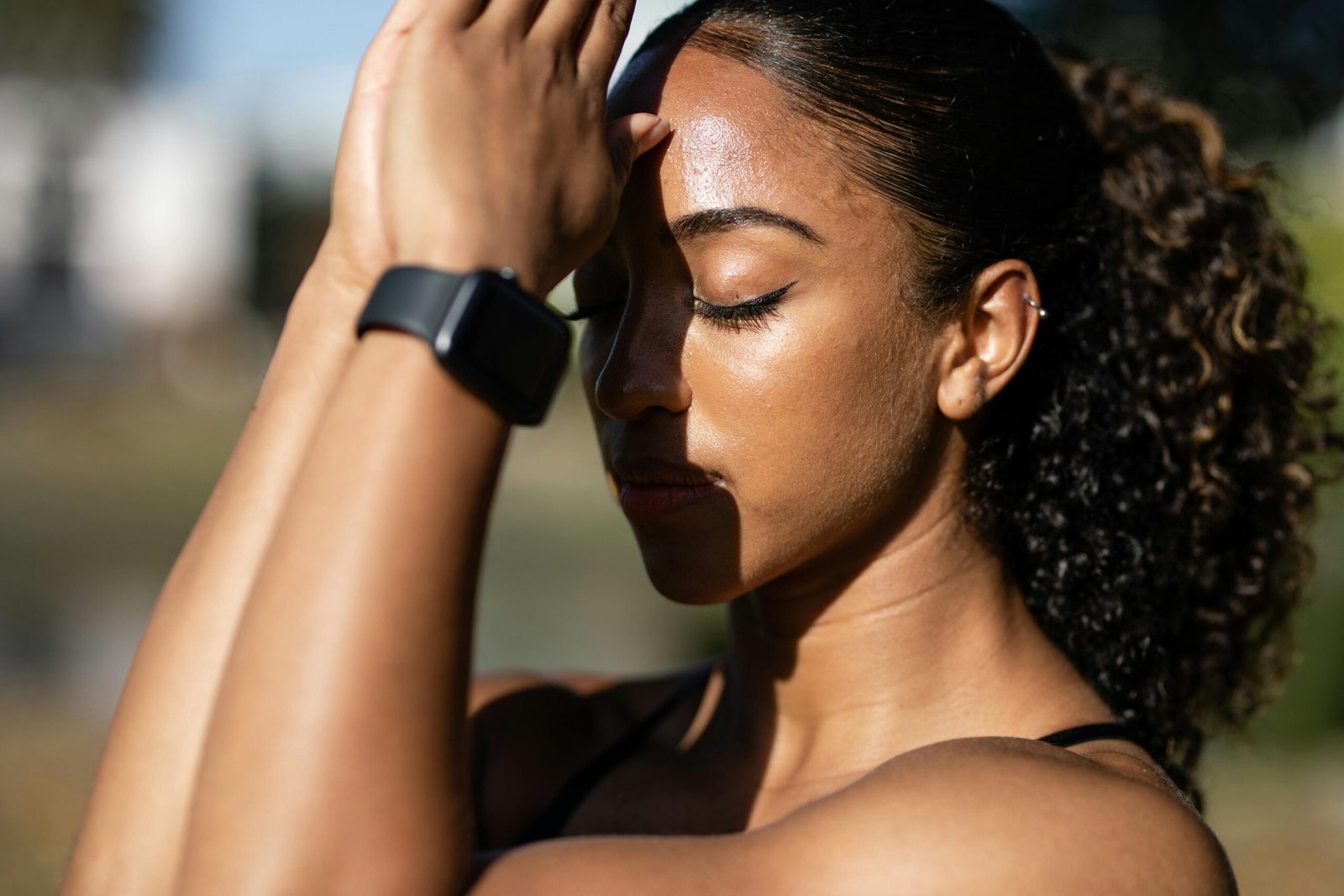 Woman practicing mindfulness with eyes closed, symbolizing emotional balance and support in bipolar treatment in Portland