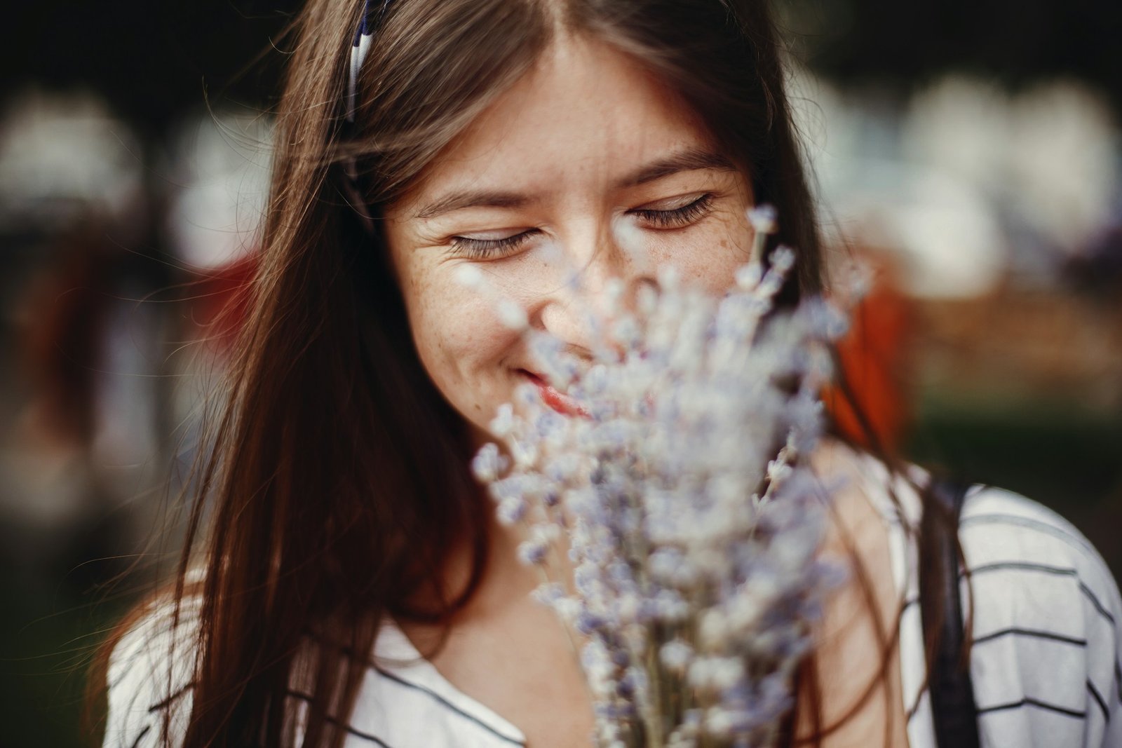 woman holding flowers