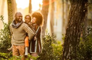 happy child with her parents